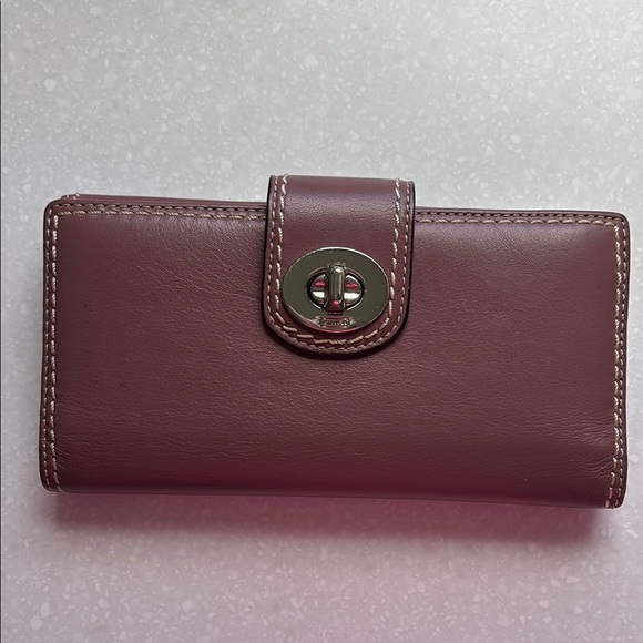 Coach Handbags - Coach turnlock Mauve Leather Wallet